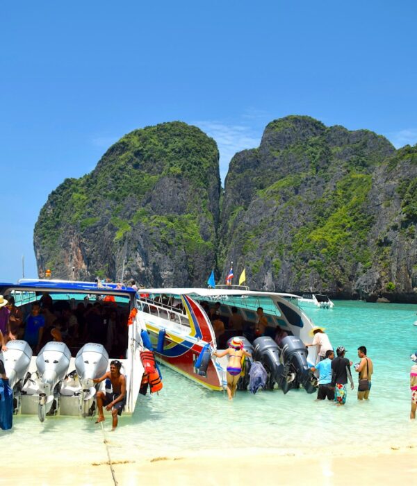People standing by boat